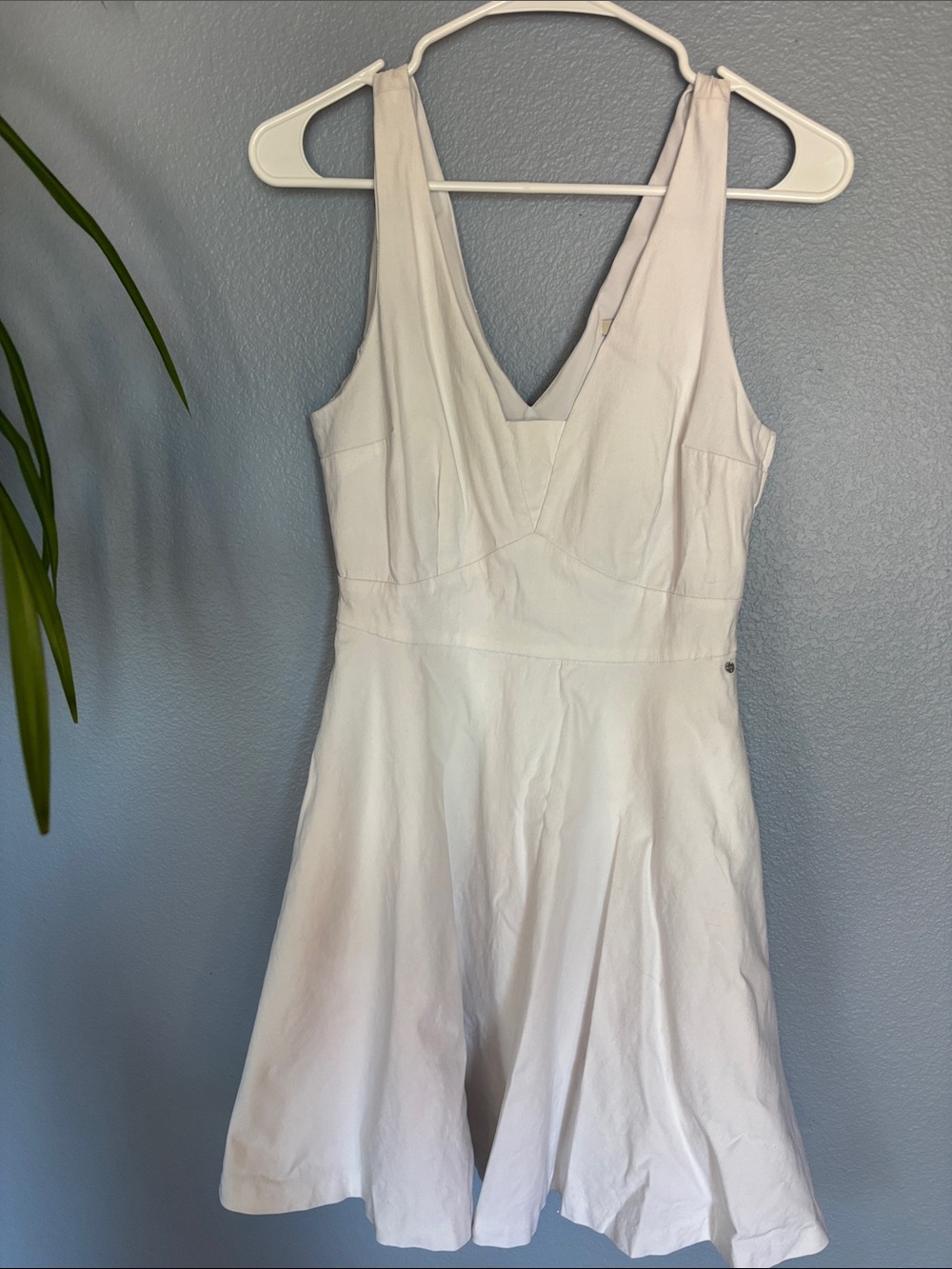 GUESS white dress with pockets. Sleeveless. Lots of stretch. Size 6